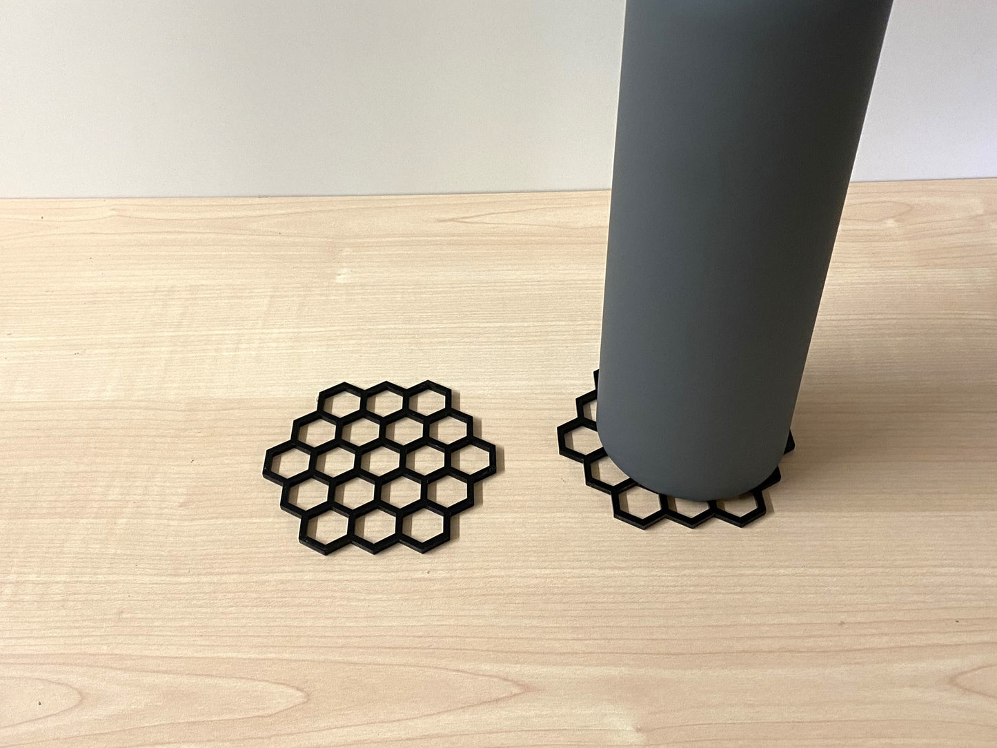 Acrylic perspex lasercut hexagonal honeycomb coaster with bottle