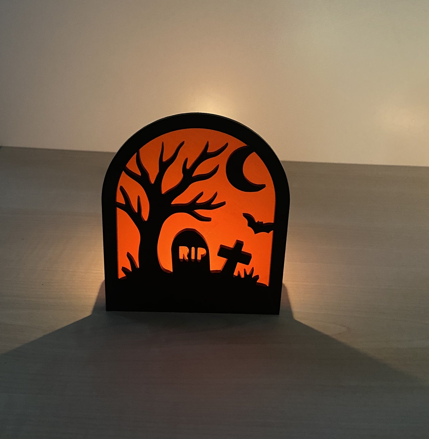 Spooky graveyard acrylic Halloween decoration with tombstones and moon