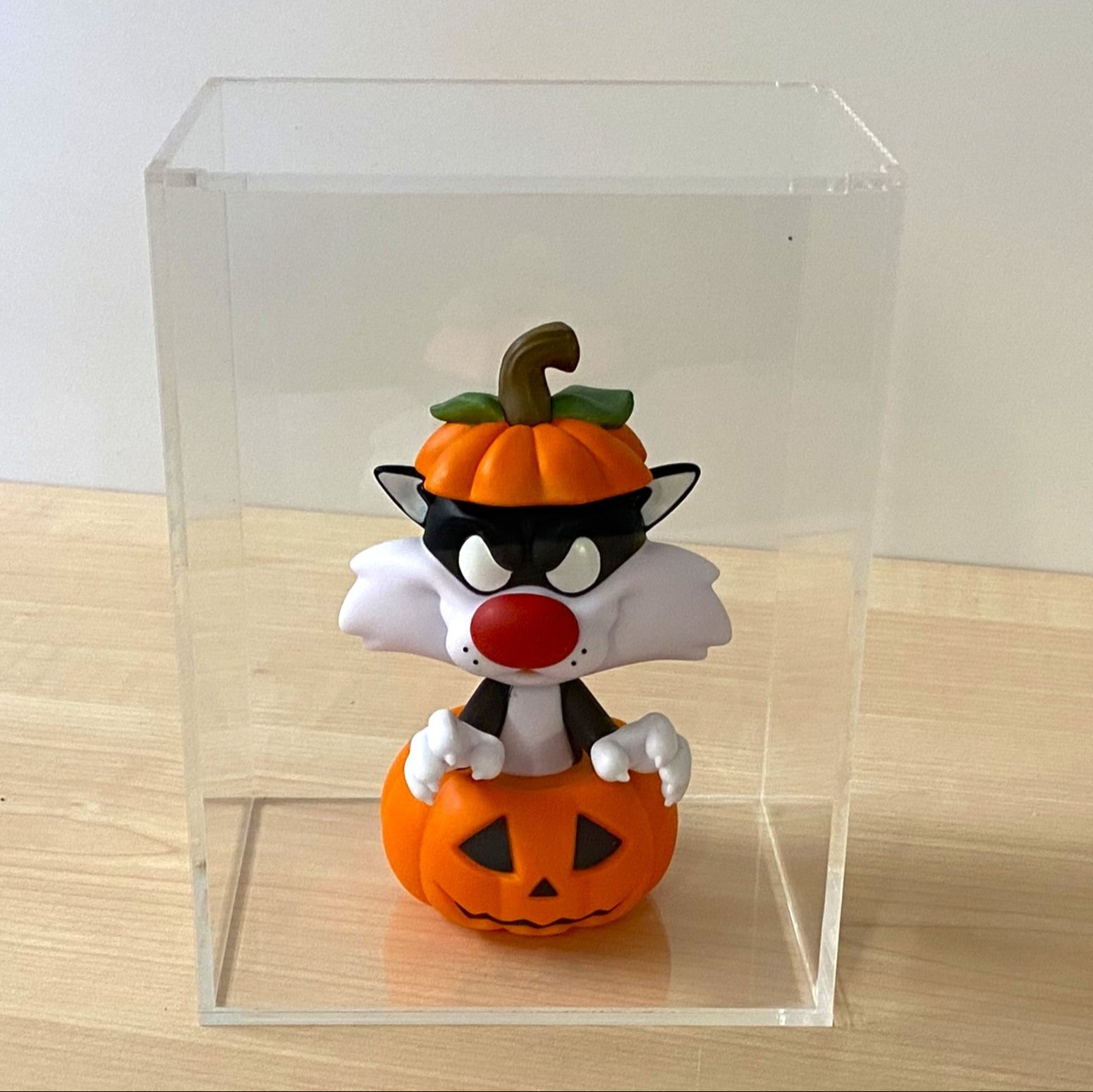 Clear acrylic Funko Pop display case with removable lid
